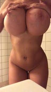 Sexy busty girl riding dildo mounted to mirror