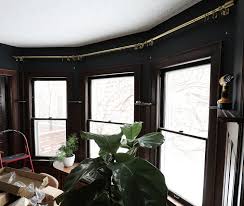 Curtains for our bay windows. Tutorial Hanging Curtains In A Bay Window Deuce Cities Henhouse