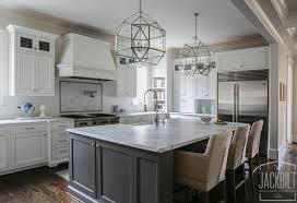 Iron mountain is a bold gray, it would look beautiful on kitchen cabinets paired with white accents. White And Gray Kitchen Designed By Jackbilt Homes Home Bunch Interior Design Ideas