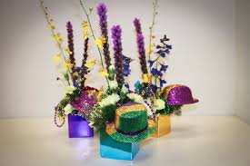 Make your own floral centerpiece following crafting instructions that use colorful silk flowers and lamp post. Party Concierge The Party Concierge Mardi Gras Sacramento