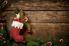Shop for christmas candy to fill stockings and to enjoy this holiday season. Festive Christmas Border With Colorful Patterned Red Boot Or Stocking Filled With Decorations And A Gift On Rustic Wood Background With Pine And Candy Cane Border Royalty Free Images Photos And Pictures