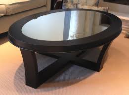 Even though the two may occupy exactly the same footprint, the wood table will have a bigger presence in the room and seem to take up more floor space. Oval Coffee Table Coffee Table Furniture Made Coffee Table Glass Coffee Table