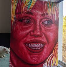 Meet Miley Cryrus, painted lady: The American singer-songwriter and actress  is the surprise star of Maison Margiela's fall 2025 campaign, wearing only  white paint and footwear in one of the most striking