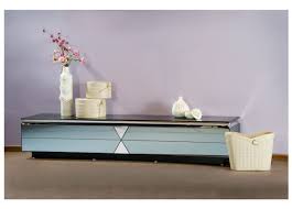 طاولة تلفاز منخفضة تعطي منظرا أكثر جاذبية للغرفة طاولات جاذبية تصميم ديكور مفروشات ميداس Furniture Home Decor Decor