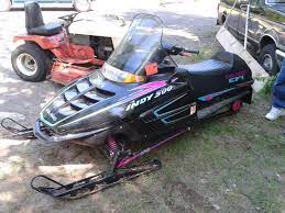 Not much snow yet only about a foot or two. Just Bought A 95 Polaris Indy 500 Efi Snowmobile Forum
