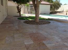 Vertically stamped sitting wall using hardscape kit. Sedona Fantastico Travertine Natural Stone Paver Qdisurfaces