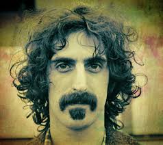 In 1966, the original confrontational TV host (who had a wooden leg) named  Joe Pyne interviewed Frank Zappa. Right off the bat in his usual  aggressive, insulting way, Pyne asks: “So, Frank,