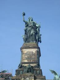 The town incorporates the village of assmannshausen, also on the rhine but on the other side of a bend in the river. Germania Statue Rudesheim Eantonio82 Flickr