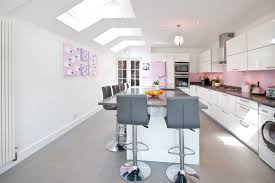 The floor design ends in a solid white finish beneath a fresh pink and grey kitchen ensemble. Grey And Pink Kitchen Ideas Photos Houzz