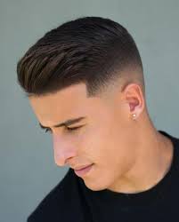 The medium fade , also called a mid fade , is a haircut whose fade stops halfway between the top of the head and the ear. Top 50 Mid Fade Haircuts By Mhp In 2020 Men S Hub Pro Mens Hairstyles Short Mid Fade Haircut Mens Haircuts Short