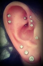 weekly faves 5 inspiring outdoor spaces pretty ear piercings cool piercings ear piercings