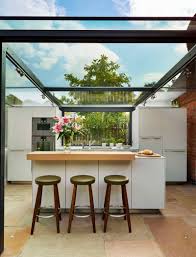 This Thatched Cottage Got A Glass Box Extension For The Kitchen Kitchen Furniture Design Modern Outdoor Kitchen Kitchen Extension