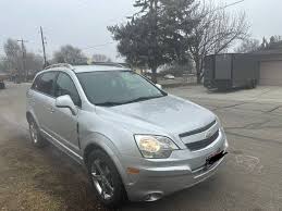 Image result for Silver Topaz 2013 Captiva