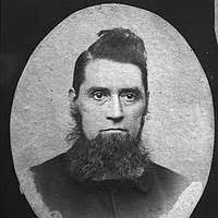 Mr. Miller, head-and-shoulders portrait, facing front]