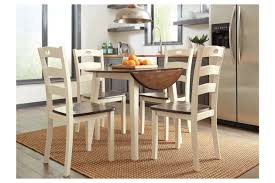 Dining room chairs by ashley furniture homestore from the latest styles of dining room chairs to bar stools, ashley homestore combines the latest trends with technology to give you the very best for your home. Woodanville Dining Table And 4 Chairs Set Ashley Furniture Homestore