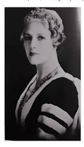 Born Enid Lindeman, by her third wedding she was 1st Viscountess Furness.  Seen here wearing a diamond floral tiara for the Cor…