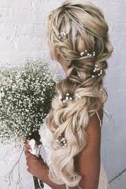 The standard halo braid updo gets an upgrade here thanks to the addition of two thick twists down the crown. 39 Adorable Braided Wedding Hair Ideas Braids For Long Hair Braided Hairstyles For Wedding Summer Wedding Hairstyles