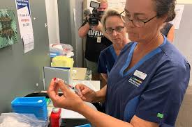 Queensland health allows scrubs to be worn by nurses and midwives as long as the queensland infectious scrubs uses the correct font for the qld health logo as approved by the queensland. Queensland S First Doses Of The Astrazeneca Covid 19 Vaccine Administered In Bundaberg And Logan Abc News