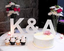 Use Initial Signs To Decorate Your Cake Table Or Sweetheart Table Freestanding Letter Table Wedding Cake Table Dessert Display Wedding Wedding Decor Photos