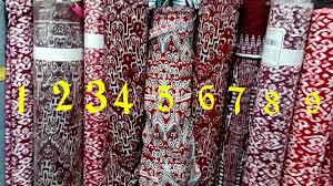 In headhunting days, trophy heads were carried in textiles. Dress Pua Kumbu Home Facebook