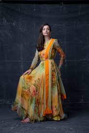 Such gowns are typically worn with a stole (a formal shawl in expensive fabric), cape or cloak. Rich Floral Print Floor Length Anarkali Suit Fashion Anarkali Dress Stylish Dresses
