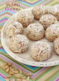 Add the egg, almond extract, and vanilla extract. Classic Italian Cookies With Soft Almond Paste Middles And A Crunchy Pine Nut Coating A Must For Any Italian Cookies Pignoli Cookies Italian Christmas Cookies