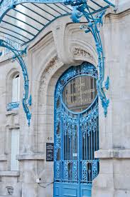 Ferronneries De Louis Majorelle La Chambre De Commerce Et D Industrie Du Meurthe Et Moselle A Nancy Realisat Arched Doors Beautiful Doors Windows And Doors