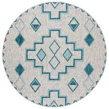 Simply put, outdoor rugs are rugs, mats or carpets made for outdoor use. Safavieh Courtyard Tahoe 7 X 7 Gray Teal Round Indoor Outdoor Geometric Coastal Area Rug In The Rugs Department At Lowes Com