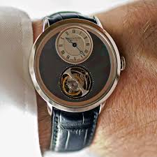 The house eschews commonly expected conventions to create singular collections imbued with english heritage. Temptations By Escapement Arnold Son Utte Watchtime Usa S No 1 Watch Magazine