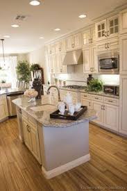 Expatica is the international community's online home away from home. Traditional Antique White Kitchen Cabinets I Almost Think Maybe The White But I Antique White Kitchen Antique White Kitchen Cabinets Simple Kitchen Remodel