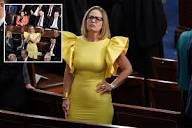 Sen. Kyrsten Sinema's yellow dress at State of the Union draws ...
