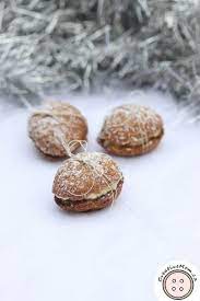 Vanilla cookies topped with buttercream frosting and sprinkles. Christmas Nut Cookies The Creative Mom