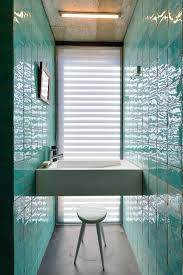 The white overall tiles provide the clean and modern look, while the starred hexagon tiles in prussian blue give a charming quaintness to it. Top 10 Tile Design Ideas For A Modern Bathroom For 2015
