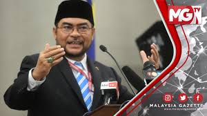 Menteri di jabatan perdana menteri (agama), datuk seri mujahid yusof rawa bercakap kepada media pada seminar hari. Terkini Saya Dituduh Dan Didakwa Akta Hasutan Mujahid Yusof