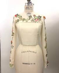 Jill biden's cashmere coat featured embroidered flowers representing every state and territory, each flower taking approximately two hours to apply. Handcrafted Embroidered Blooms For Unity Gabriela Hearst X Dr Jill Biden Irenebrination Notes On Architecture Art Fashion Fashion Law Technology