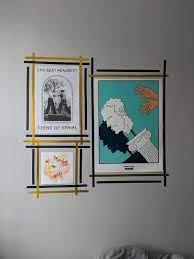 Reusable adhesives and tapes are strong enough to hold loose pictures or posters (not in a frame), but are not designed to hold much more than one pound (0.45 kg). 10 Ideas To Decorate Your Walls When You Are Not Allowed To Put Anything Up On Walls In A Rental Place Bonjour Studio
