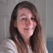 Who is responsible for maintaining the lawn at the 9mile I-94 exit ramp in  Michigan?