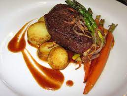 In the mood for a celebration? Seared Beef Tenderloin Sous Vide Glazed Baby Carrots Grilled Asparagus Confit Potatoes Bordelaise Sauc Confit Potatoes Glazed Baby Carrots Bordelaise Sauce