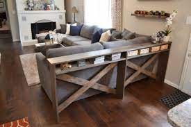 Usually, sofa tables are a long, thin table that fits perfectly right behind your couch, sometimes filling the space between its back and the wall or perhaps just visually finishing up the space division and giving you an extra spot to put things, depending on how you've got your seating laid out. 10 Diy Sofa Table Ideas Recycled Crafts