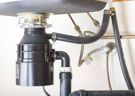 my garbage disposal hums but doesn't work