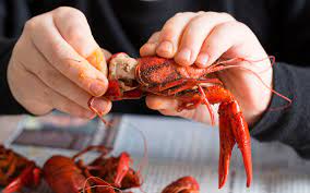 Guide To Peeling Crawfish | How To Eat Crawfish | Acadia Crawfish