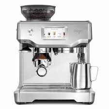 The portafilter inserted in the grinding. The Barista Touch Espresso Machine Sage