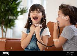 Brother sister playing doctor hi-res stock photography and images - Alamy