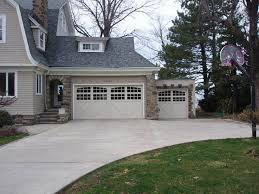 You Can T Go Wrong With A Classic Carriage House Garage Door Shown Is A C H I Model 5315a In Almond Wi Carriage House Garage Doors Garage Doors Overhead Door