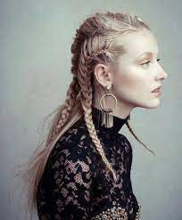 The cornrows are tight in the style, and it's finished off with a twisted braid formed into a unique bun. This Trend Is So Crazy Punk Braided Hair Trend Crazy Hair Punk Braids Frisuren Geflochtene Frisuren Flechtfrisuren