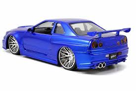 The skylines used during filming were all r34s, a model introduced way back in 1998. Fast Furious Brian S Nissan Skyline Gt R R34 Blue Jada 1 24 97173 Passion Diecast