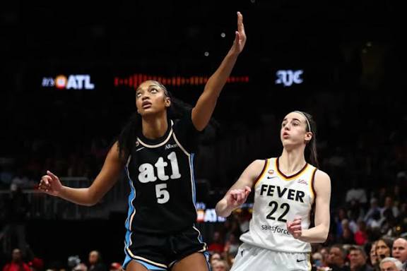 Angel Reese makes WNBA history in win over Caitlin Clark's Fever - Yahoo  Sports