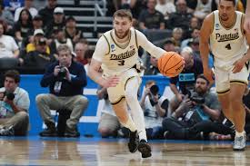 Purdue star Braden Smith breaks Bobby Hurley's all-time assist record while leading Boilermakers past Queens in NCAA tournament