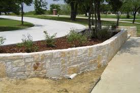 Building a stone wall rock retaining wall stone fence stone walkways stone masonry garden types dry stone rock wall garden structures. Hardscape Landscape Services Godbold Landscape Services Inc