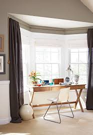 Compared to standard window designs, they provide wider views and more natural light as the sun moves across the sky. 14 Beautiful Bay Window Treatment Ideas For Every Style Living Room Windows Bay Window Living Room Bay Window Bedroom